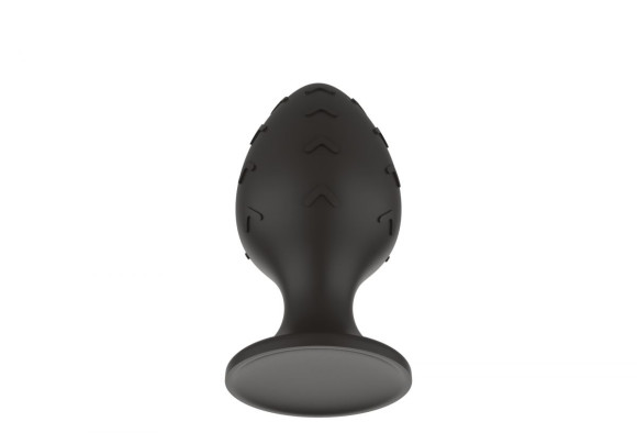 Черная средняя силиконовая анальная пробка с рельефом в виде галочек