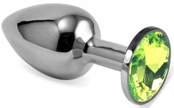 Серебристая гладкая анальная пробка с салатовым кристаллом - 8,5 см.