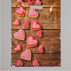 Полиэтиленовый пакет с розовыми сердечками - 31 х 40 см. Полиэтиленовый пакет с розовыми сердечками - 31 х 40 см.